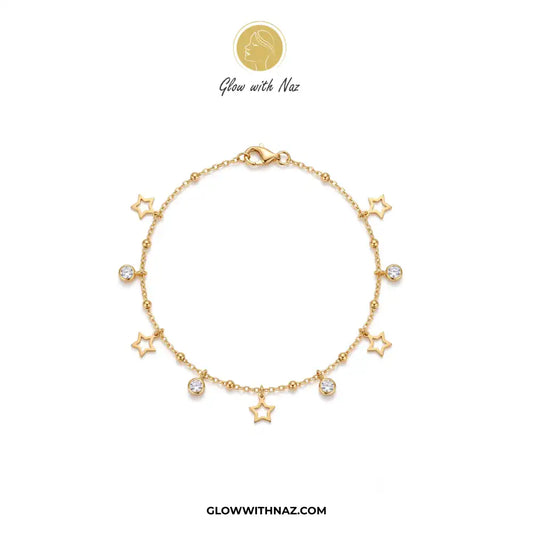 A gold chain bracelet featuring multiple star-shaped charms and two clear round gemstones, displayed on a clean white background with the brand logo 'Glow with Naz' at the top. stainless steel anklet, coin anklet, diamond anklet, waterproof anklet, tarnish resistant jewelry, minimalist jewelry, gold coin anklet, silver coin anklet, viral trending jewelry, eye catching anklet, summer jewelry, beach accessories, foot jewelry, trendy anklets for women, everyday jewelry, dainty anklet, layered anklet, charm ank