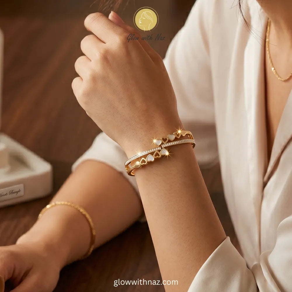 Close-up product shot of the Glow With Naz B0041 B.webp stainless steel tarnish-free heart pave bangle.