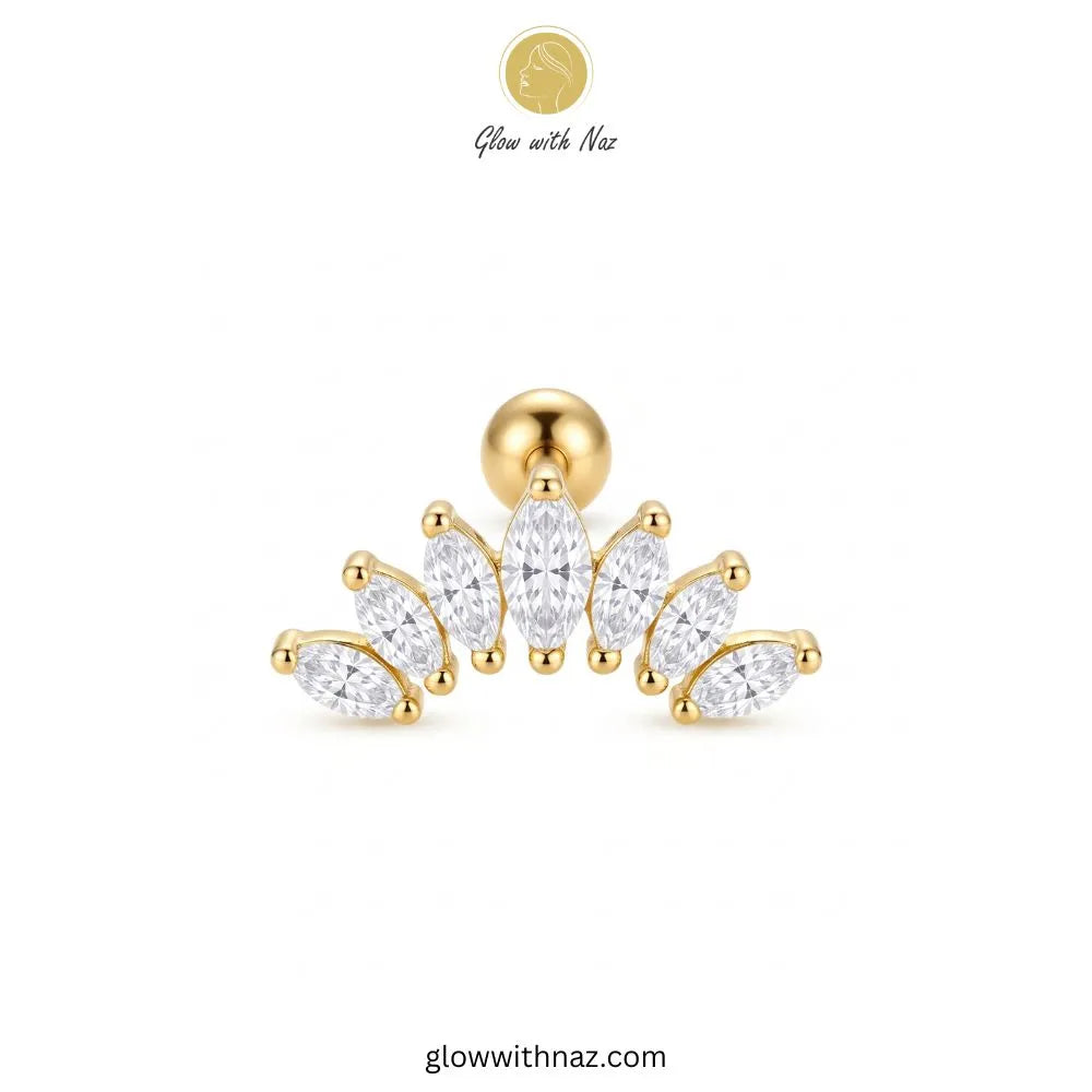 A gold-toned curved stud earring with marquise-cut clear stones, shown on a plain white background. A small 'Glow with Naz' logo appears above the product, and 'glowwithnaz. Glow With Naz Stainless Steel Sunshine Helix Jewelry featuring sparkling diamond details and a stunning radiant design.