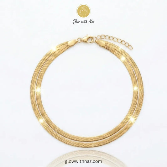 Elegant double-layered herringbone gold chain bracelet by Glow with Naz