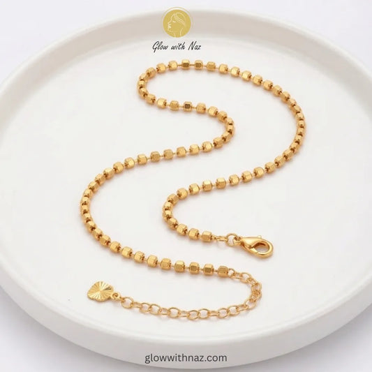 Gold ball chain anklet pair with lobster clasp and extension chain in 18K gold plated stainless steel, anti-tarnish payal pair online Pakistan by Glow with Naz