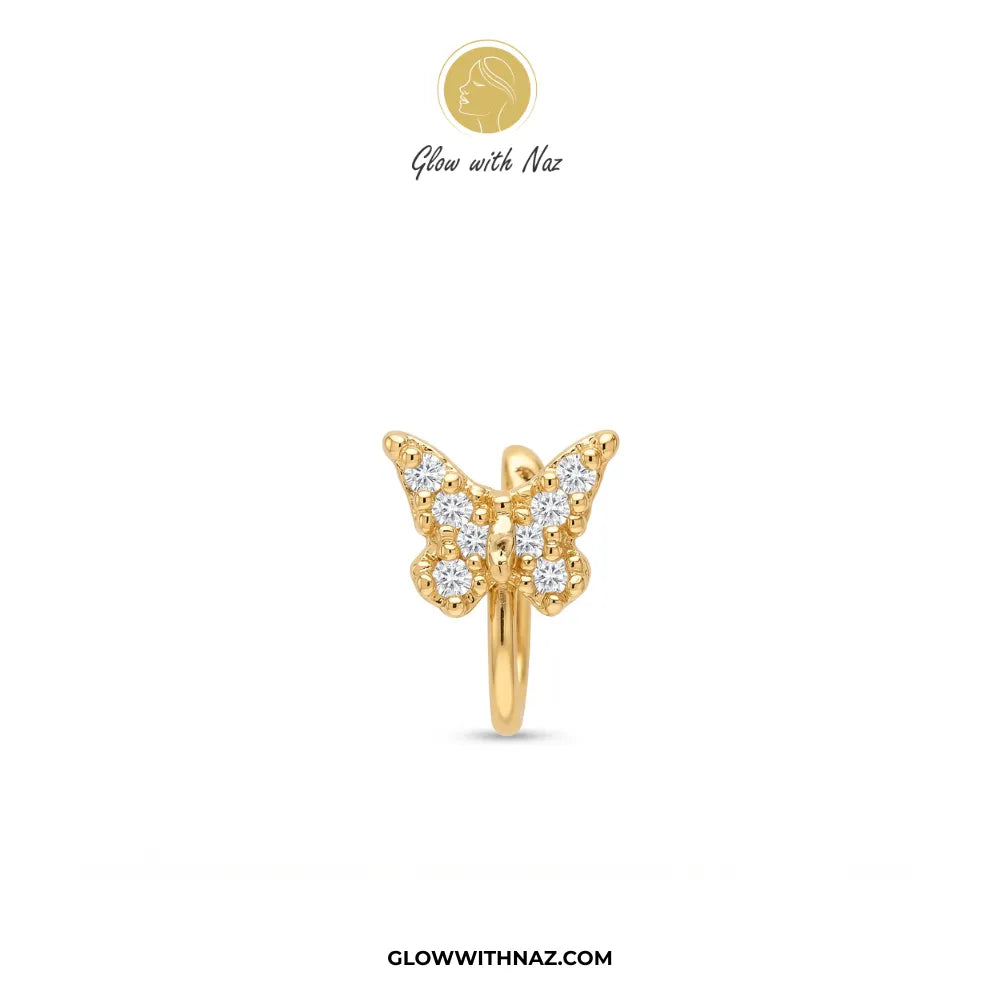 Non-pierced gold butterfly chutki nose pin worn on model nostril by Glow With Naz
