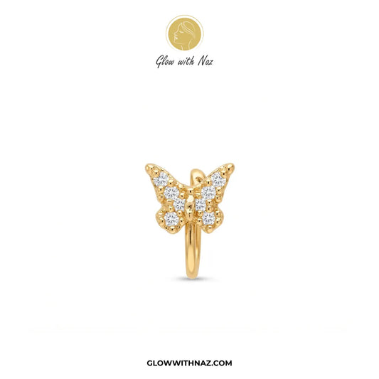 Non-pierced gold butterfly chutki nose pin worn on model nostril by Glow With Naz
