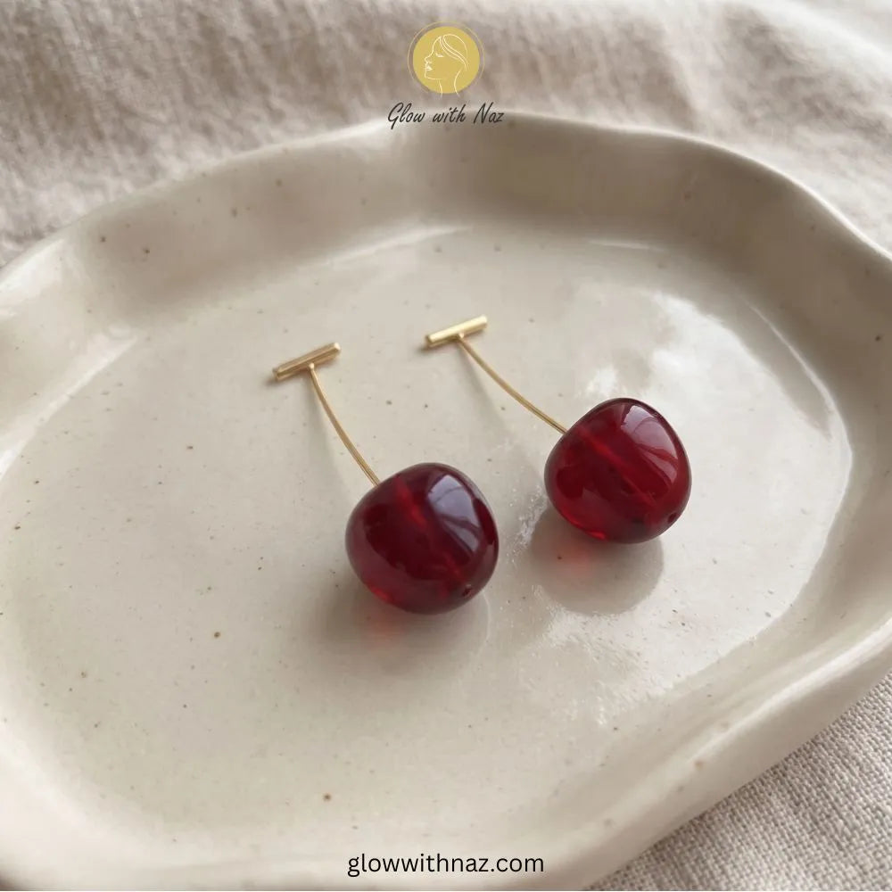Add playful elegance with our Red Resin Cherry Drop Bar Earrings. Lightweight & viral trending, they deliver juicy charm
