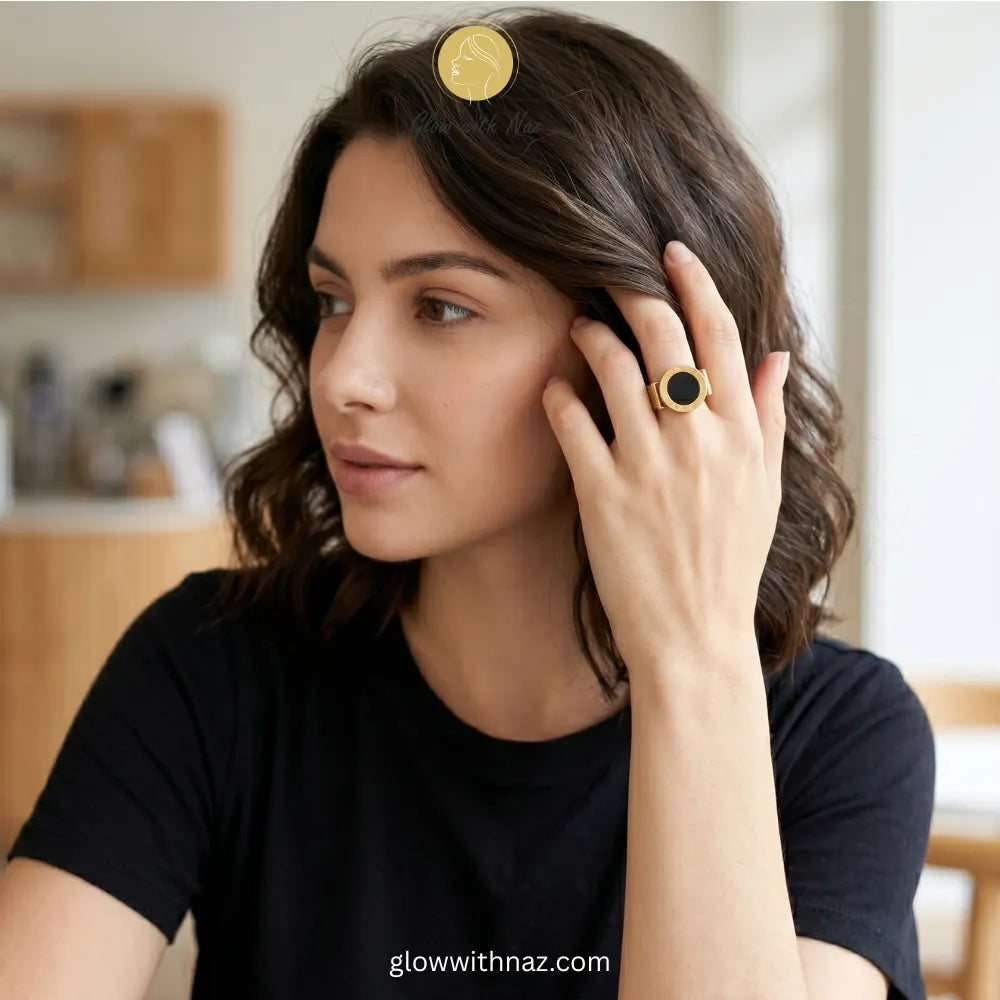 High-quality stainless steel gold ring with black enamel mesh, perfect for modern, timeless fashion.