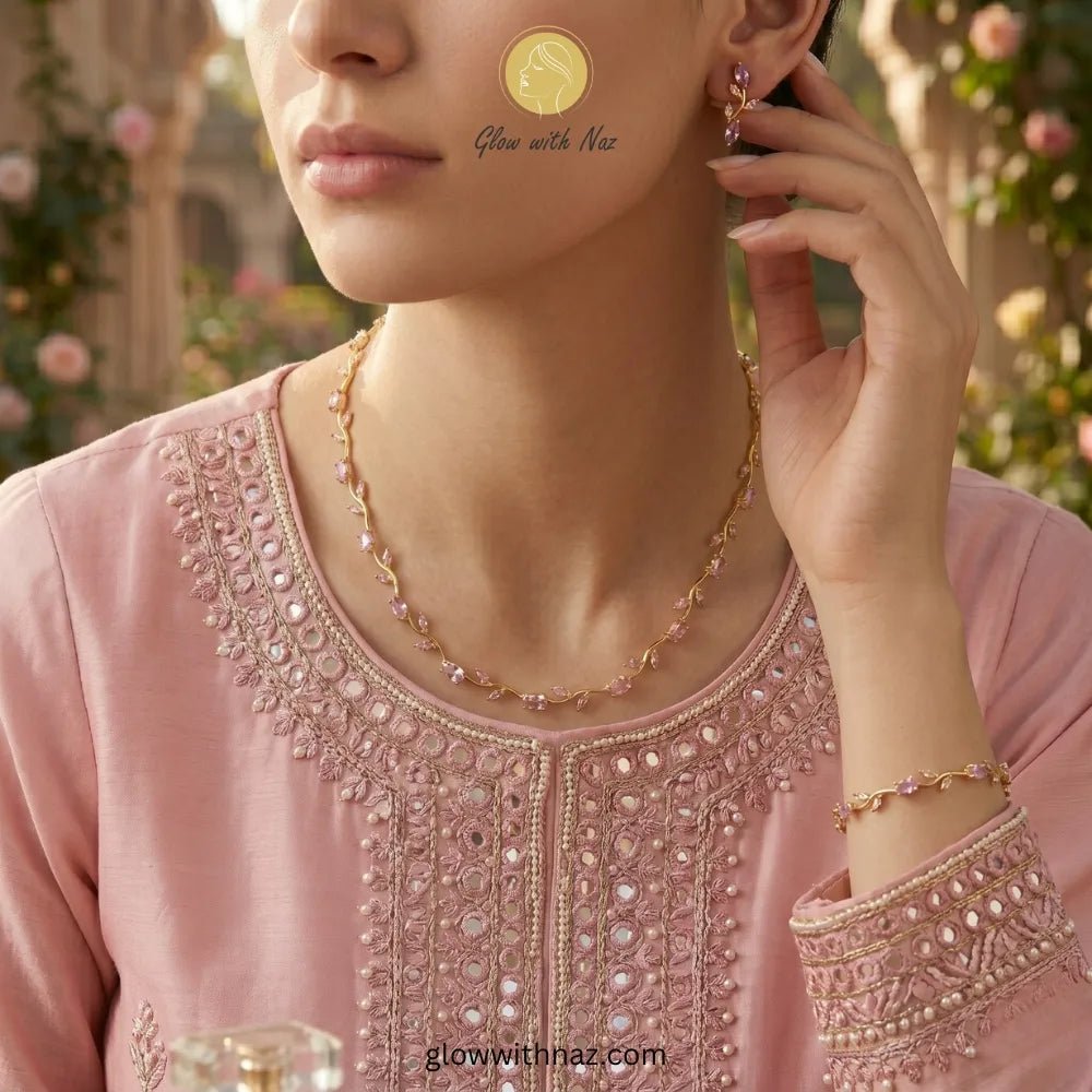 Gold Plated Stainless Steel Pink Tulip Necklace For Women - Gold Plated Stainless Steel Pink Tulip Necklace For WomenJewelryGlow With NazGlow With NazN0050N0050Close-up of floral vine motif and pink stones - Glow with Naz Pink tulip Necklace with pink stones on a white plate, brand 'Glow with Naz' visible Pink tulip Necklace with pink stones on a white plate, brand 'Glow with Naz' visible