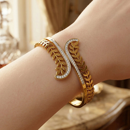 Golden Laurel Leaf Bypass Bangle – Sparkling Zircon - Encrusted Gold - Plated Cuff - Golden Laurel Leaf Bypass Bangle – Sparkling Zircon - Encrusted Gold - Plated CuffJewelryGlow with NazGlow With NazN-B008Golden Laurel Leaf Bypass Bangle – Sparkling Zircon - Encrusted Gold - Plated Cuff
