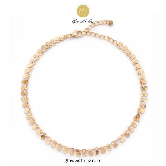 Minimalist Payal Dainty Gold Coin Anklet for Women - Minimalist Payal Dainty Gold Coin Anklet for WomenJewelryGlow With NazGlow With NazA003A003Flat lay of an unclasped gold anklet featuring small textured coin charms and an adjustable lobster clasp against a clean white background