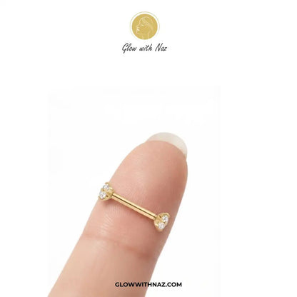 12mm Anti Tarnish Double Diamond Stud Helix Piercing Jewelry - 12mm Anti Tarnish Double Diamond Stud Helix Piercing JewelryJewelryGlow With NazGlow With NazE051A gold barbell-style labret piercing ring with clear gemstones, shown worn on a finger against a white background, with the brand name Glow with Naz at the top. helix piercing, cartilage earring, double diamond stud, stainless steel jewelry, body jewelry, viral trending jewelry, ear stack earrings, cartilage piercing jewelry, minimalist p