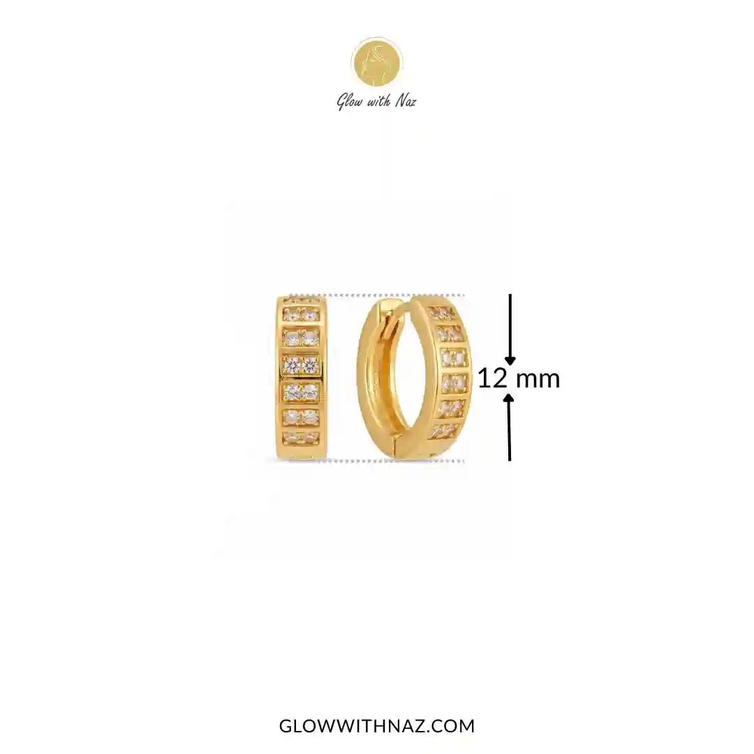 18K Gold Plated Sparkling Small 2-Line Diamond Huggie Earrings for Women - 18K Gold Plated Sparkling Small 2-Line Diamond Huggie Earrings for WomenJewelryGlow With NazGlow With NazE060Gold huggie hoop earrings with pavé-set clear stones, shown on a white background with a coin for scale and a 12 mm size marker. Glow with Naz branding is visible.