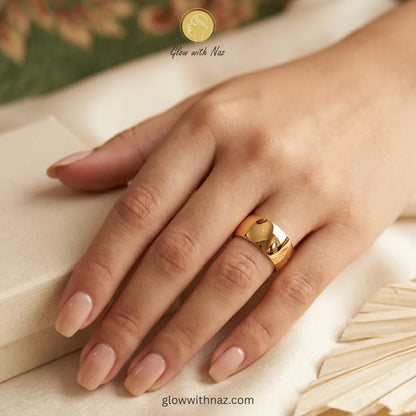 A minimalist 18k gold plated wide dome band ring, polished finish, jewelry by Glow with Naz.