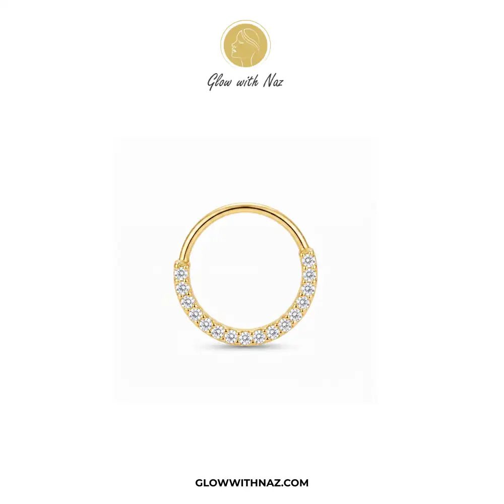 9 mm Anti Tarnish Front Zircon Stainless Steel Nose Ring - 9 mm Anti Tarnish Front Zircon Stainless Steel Nose RingJewelryGlow With NazGlow With NazNR006A gold huggie hoop earring with a row of clear pavé stones along the front curve, shown on a plain white background with the brand name Glow with Naz at the top. nose ring, front zircon nose ring, stainless steel nose ring, zircon nose ring, gold nose ring, silver nose ring, hoop nose ring, septum ring, cartilage earring, helix piercing, tragus 
