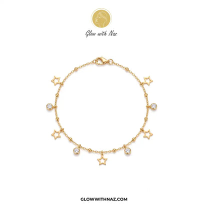 A gold chain bracelet featuring multiple star-shaped charms and two clear round gemstones, displayed on a clean white background with the brand logo 'Glow with Naz' at the top. stainless steel anklet, coin anklet, diamond anklet, waterproof anklet, tarnish resistant jewelry, minimalist jewelry, gold coin anklet, silver coin anklet, viral trending jewelry, eye catching anklet, summer jewelry, beach accessories, foot jewelry, trendy anklets for women, everyday jewelry, dainty anklet, layered anklet, charm ank