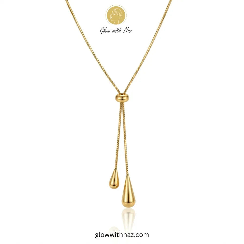 Adjustable gold lariat necklace with teardrop charms by Glow with Naz