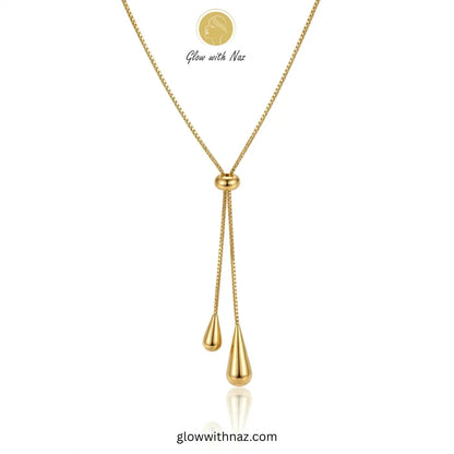 Adjustable gold lariat necklace with teardrop charms by Glow with Naz