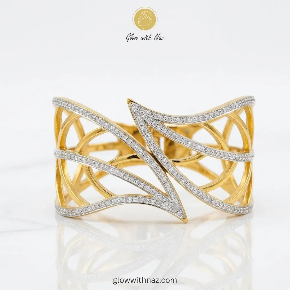 Angled view showing the width and craftsmanship of the gold cuff