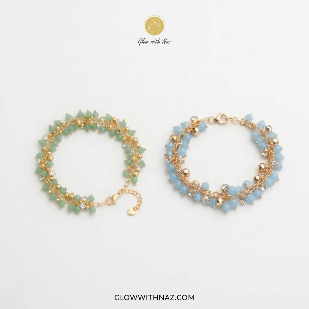 Sea green and sky blue crystal bead cluster bracelet in gold on wrist, trendy beaded bracelet for women by Glow With Naz