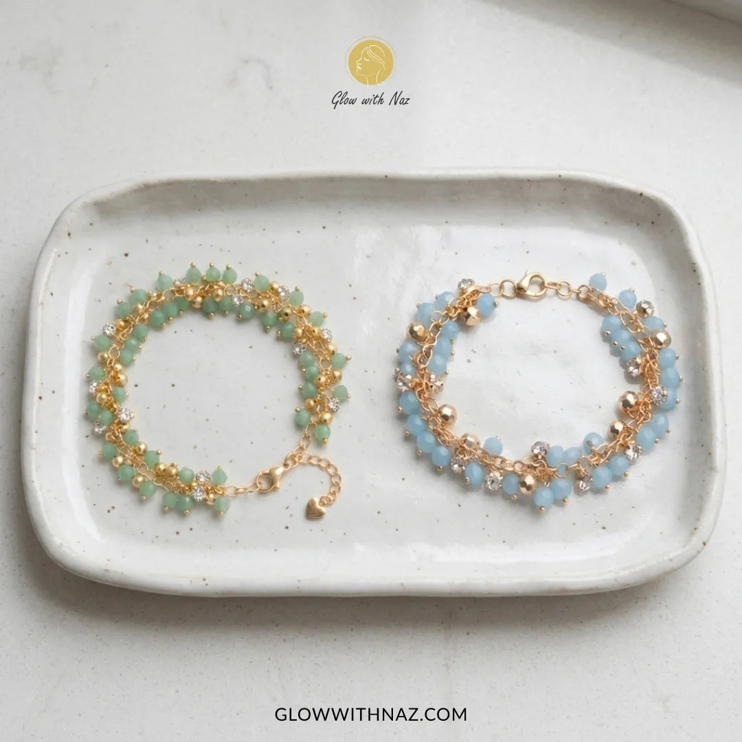 Sea green and sky blue crystal bead cluster bracelet in gold on wrist, trendy beaded bracelet for women by Glow With Naz