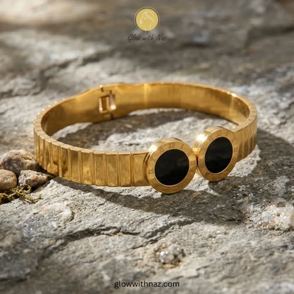 Close-up of Roman numeral engraving and black onyx-style detail