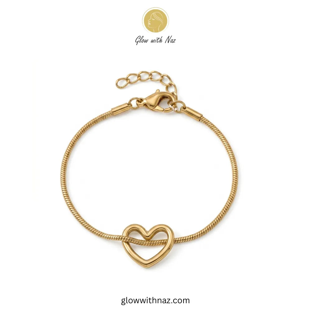 Dainty gold heart charm snake chain bracelet by Glow with Naz