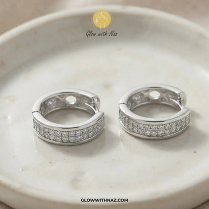 Silver zircon mid-size slide hoop earrings and zircon 3-bar mini hoops set by Glow With Naz
