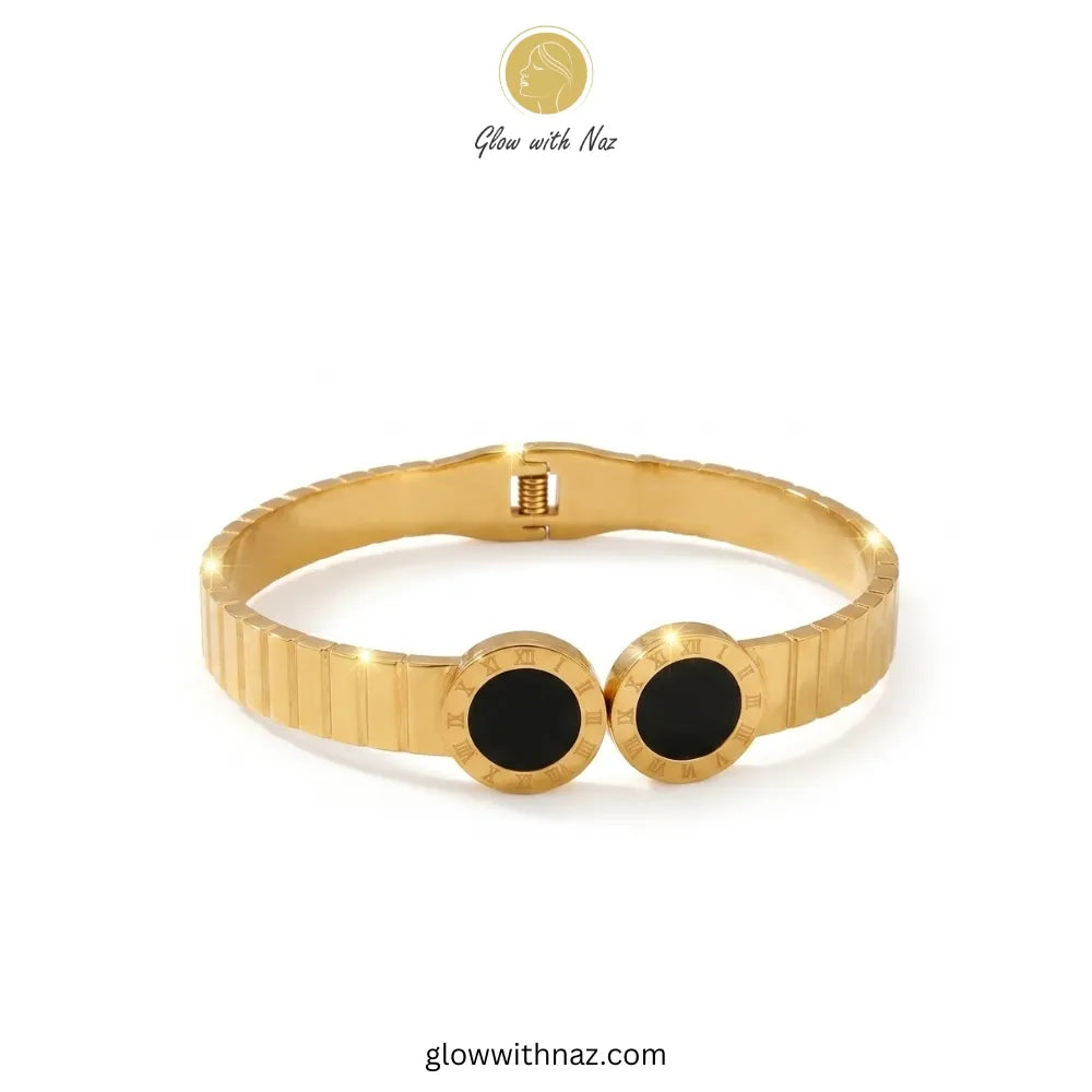 Elegant Roman numeral gold bangle with black accents by Glow with Naz