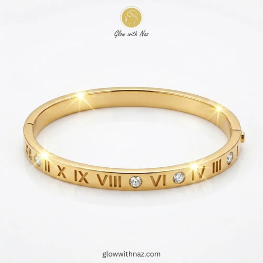Elegant Roman numeral gold bangle with sparkling stone accents by Glow with Naz