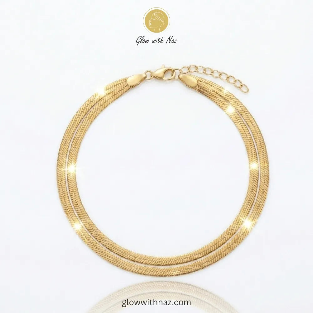 Elegant double-layered herringbone gold chain bracelet by Glow with Naz