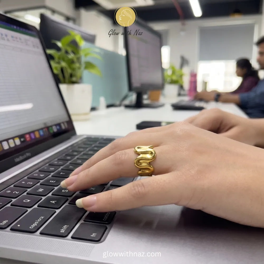 Stylish, free-size gold molten wave ring, designed for a comfortable and adjustable fit.