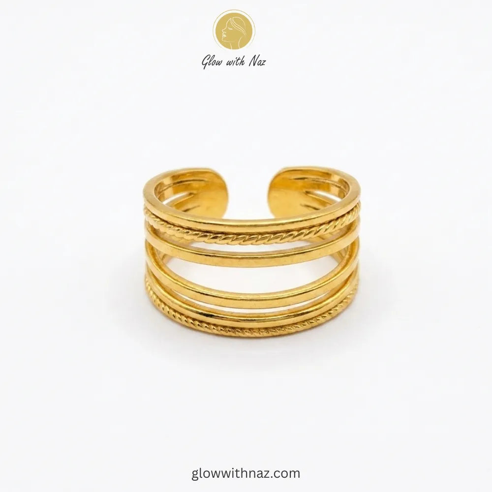 A stylish, free-size gold ring with a layered band design, perfect for stacking or solo wear.