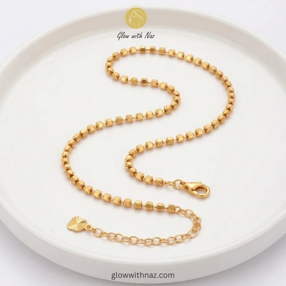 Gold ball chain anklet pair with lobster clasp and extension chain in 18K gold plated stainless steel, anti-tarnish payal pair online Pakistan by Glow with Naz