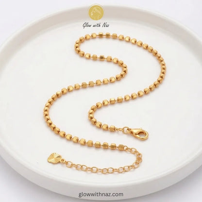 Gold ball chain anklet pair with lobster clasp and extension chain in 18K gold plated stainless steel, anti-tarnish payal pair online Pakistan by Glow with Naz