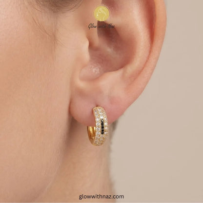 Gold multi row pave zircon huggie hoop earrings featuring 4 black center accent stones by Glow With Naz