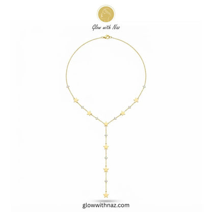 Gold plated Y-shaped lariat necklace with seven star charms and cubic zircon accents by Glow With Naz