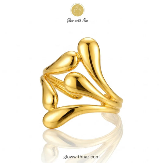 Gold sculptural teardrop statement ring in 18K gold plated stainless steel, anti-tarnish artistic ring available online in Pakistan by Glow with Naz