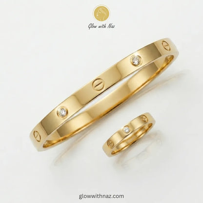 Iconic screw-motif gold bangle and matching ring set by Glow with Naz