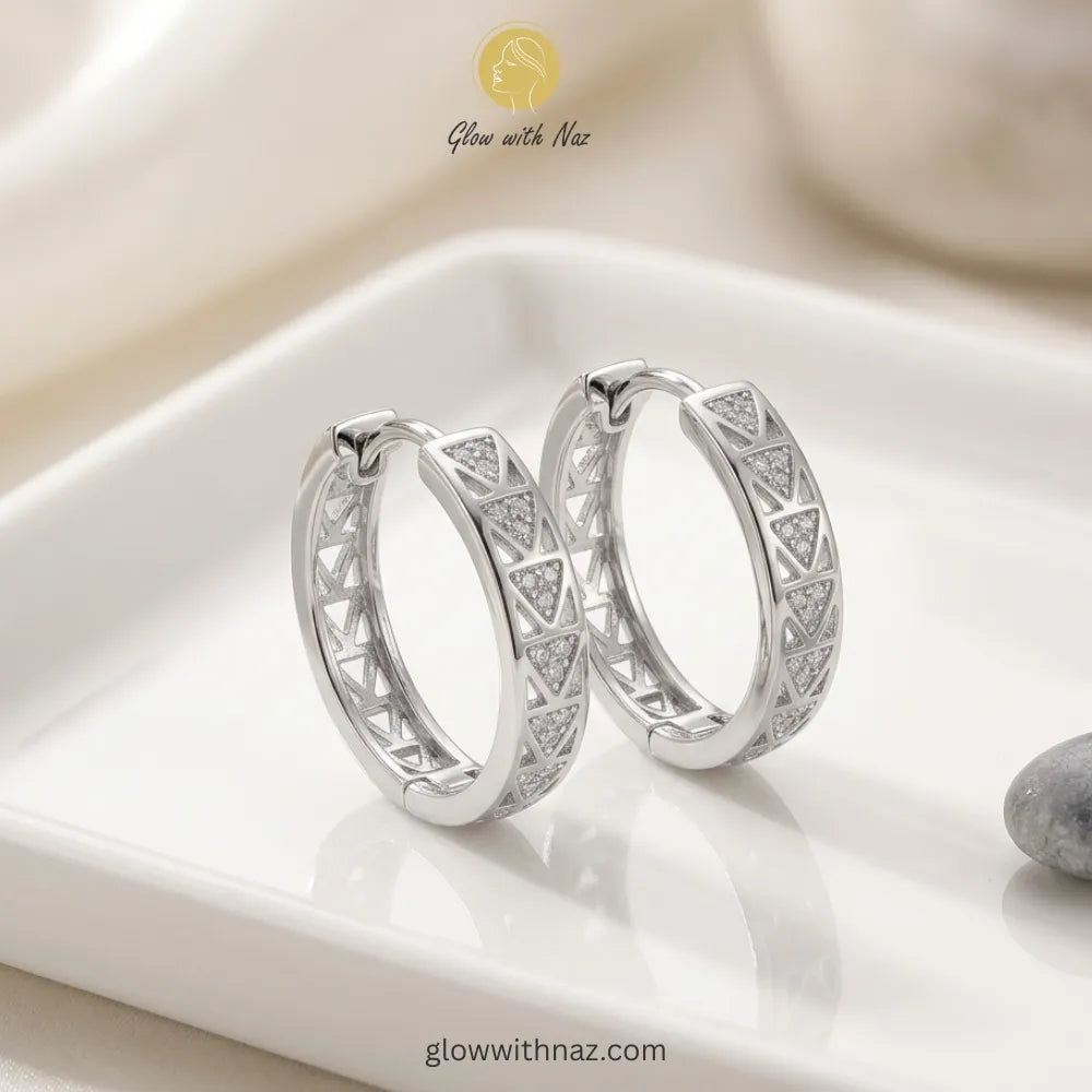 Lifestyle shot of modern geometric silver hoop earrings for everyday style