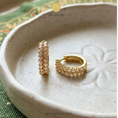 Lifestyle shot of modern marquise crystal hoops for glamorous everyday style