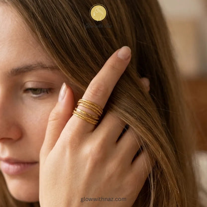 Durable, tarnish-resistant gold stainless steel ring featuring an elegant multi-layer band design.