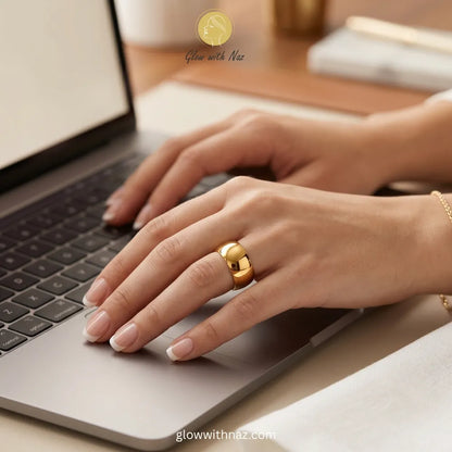Elegant gold wide dome band ring, polished stainless steel, perfect for daily wear or formal events.