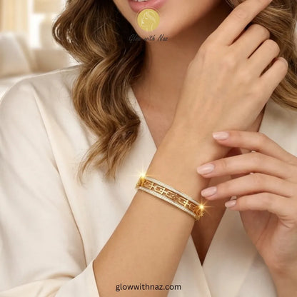 Minimalist cut-out gold bangle styled for an evening look