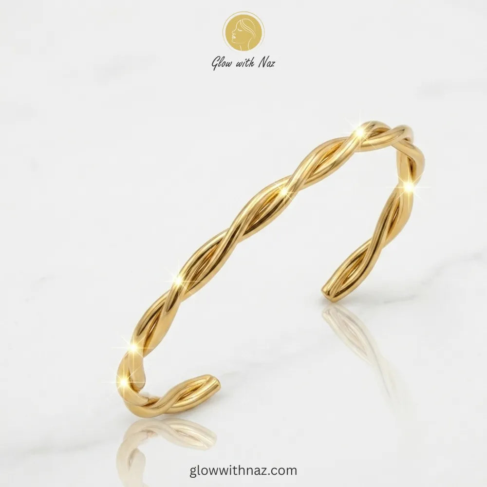 Minimalist twisted gold cuff styled for everyday luxury