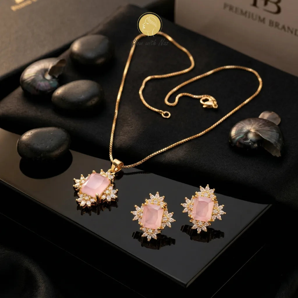 Baby pink stone pendant necklace and earrings, close-up