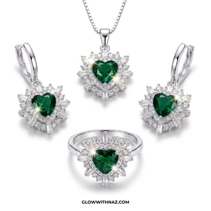 Jewelry set with heart-shaped green gemstones on a white background necklace, pendant necklace, necklace set, locket set, simple necklace, pendant set, pendant, chain necklace, diamond pendant, diamond necklace, locket necklace, neck chain, girls locket, heart locket, pendant for girls, necklace for girls, heart necklace, locket for girls, diamond locket, pendant necklace for girls, heart chain locket, stainless steel necklace, double chain necklace, ruby necklace, neck chain for girls, locket design, penda