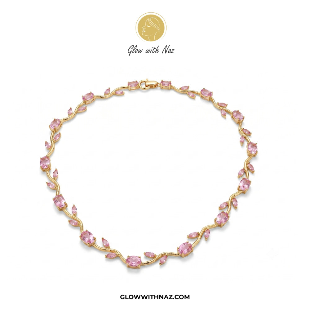 Tulip necklace Gold bracelet with pink stones on a white background, featuring the brand 'Glow with Naz'.