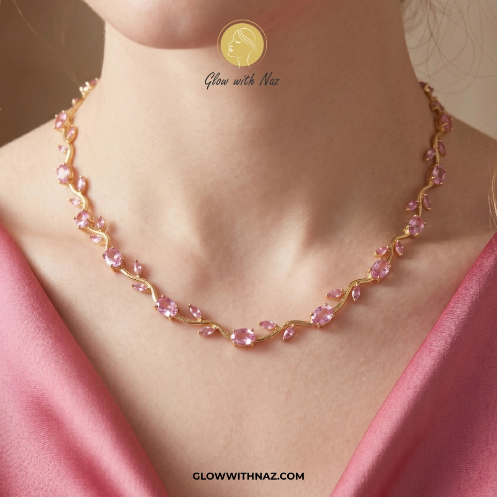 Pink tulip necklac beaded necklace on a person with 'Glow with Naz' branding. 