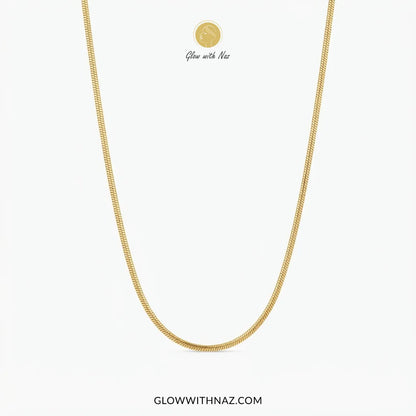A gold chain necklace displayed in a U-shape against a clean white background, with the brand name 'Glow with Naz' and website 'GLOWWITHNAZ.COM' printed on the image.