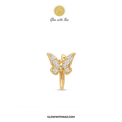 Non-pierced gold butterfly chutki nose pin worn on model nostril by Glow With Naz