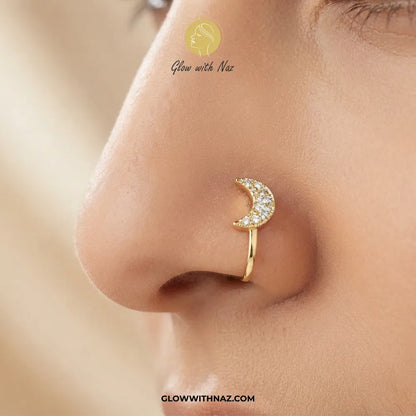 Non-pierced gold crescent moon chutki nose pin worn on model nostril by Glow With Naz