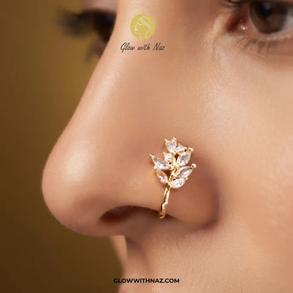 Non-pierced gold crystal leaf vine chutki nose pin worn on model nostril by Glow With Naz